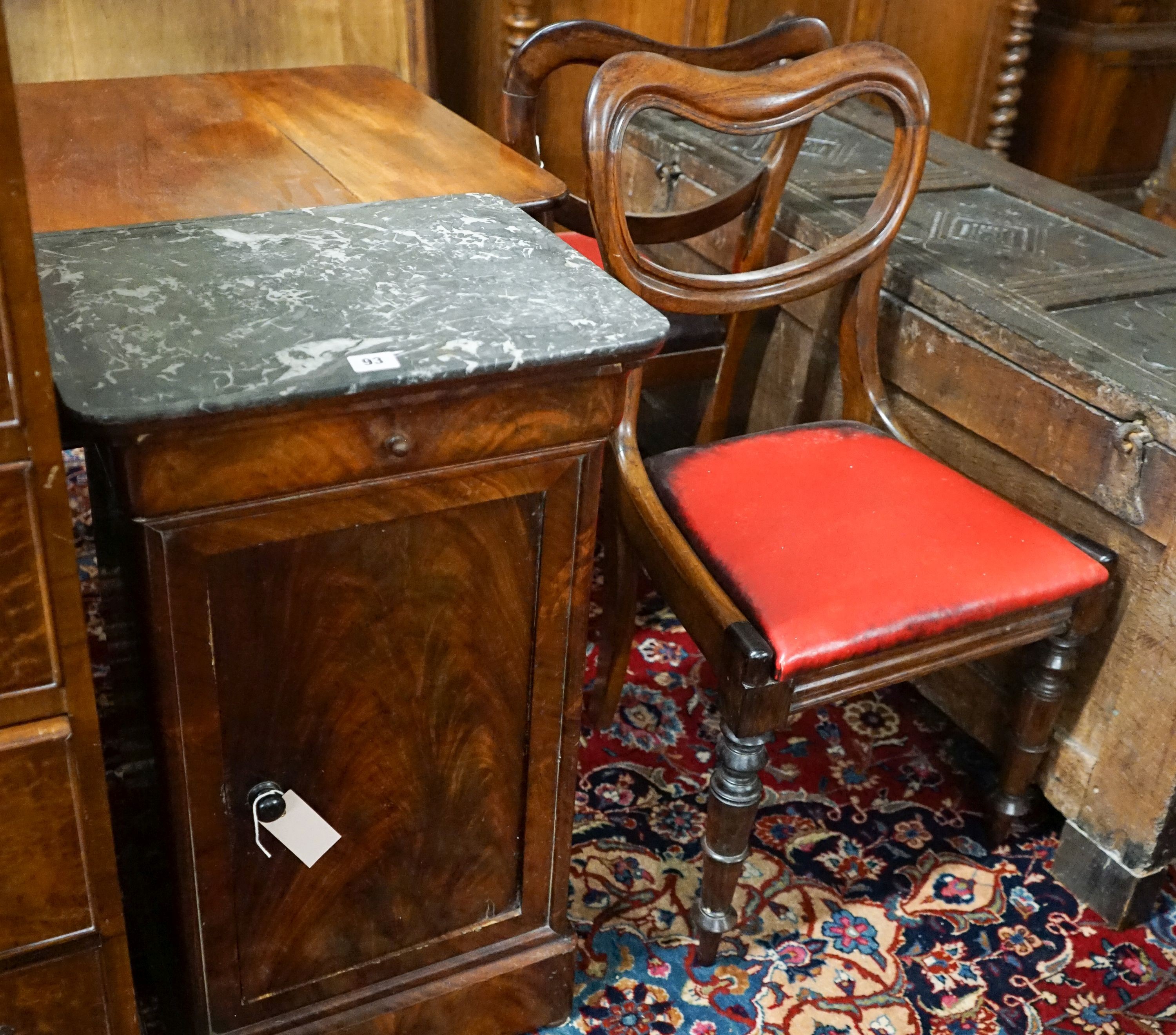 A Victorian mahogany commode cupboard with grey marble top, width 93cm, depth 36cm, height 75cm together with a pair of Victorian rosewood kidney back dining chairs